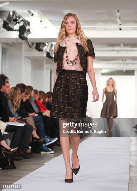 Model wearing Oscar de la Renta walks the runway during the Oscar de la Renta Pre-Fall 2013 Collection on December 10, 2012 in New York City.