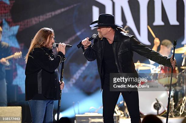 Johnny Van Zant of Lynyrd Skynyrd and singer and co-host Trace Adkins perform onstage during the 2012 American Country Awards at the Mandalay Bay...