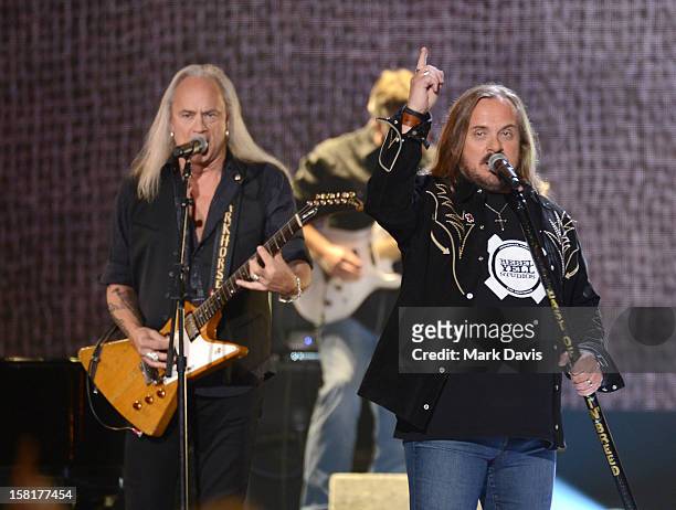 Rickey Medlocke and Johnny Van Zant of Lynyrd Skynyrd perform onstage during the 2012 American Country Awards at the Mandalay Bay Events Center on...