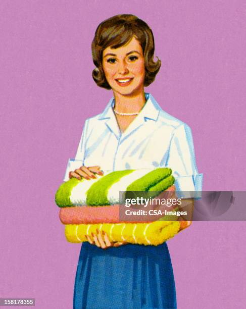 frau mit gefalteten handtücher - woman smiling stock-grafiken, -clipart, -cartoons und -symbole