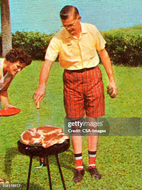 man grilling steaks - older couple making dinner stock illustrations