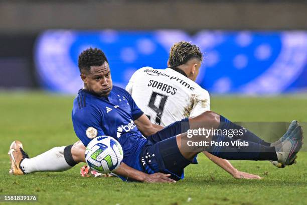 Matheus Jussa of Cruzeiro and Tiquinho Soares of Botafogo fight for the ball during a match between Cruzeiro and Botafogo as part of Brasileirao 2023...