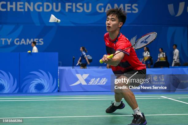 Wang Zhenghang of Team China competes during the Men's Singles match in Mixed Team Group A against Team France on Day 2 of 31st FISU Summer World...