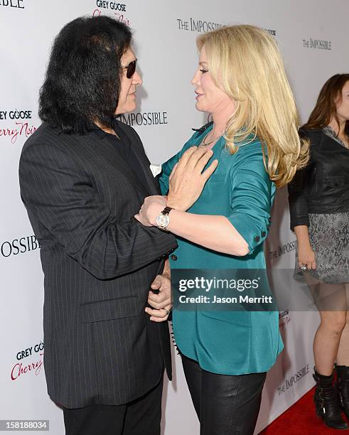 Musician Gene Simmons and Shannon Tweed attend the Los Angeles premiere of Summit Entertainment's "The Impossible" at ArcLight Cinemas Cinerama Dome...