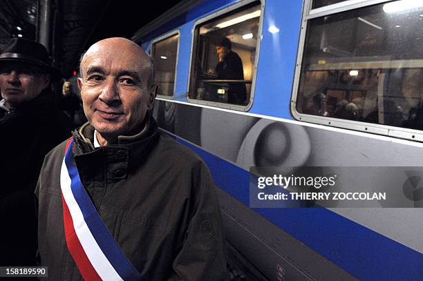 The mayor of Vichy, Claude Malhuret takes part in the blocking of a train commuting from Paris to Clermont-Ferrand, on December 10, 2012 at the...