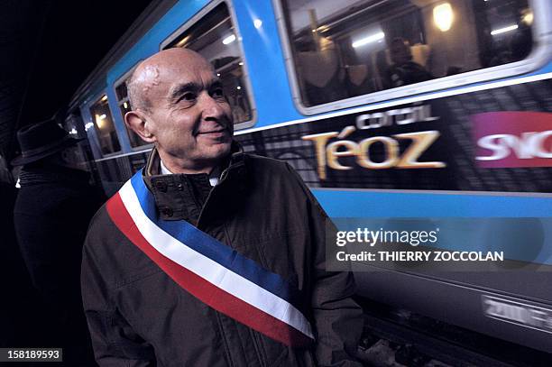 The mayor of Vichy, Claude Malhuret takes part in the blocking of a train commuting from Paris to Clermont-Ferrand, on December 10, 2012 at the...