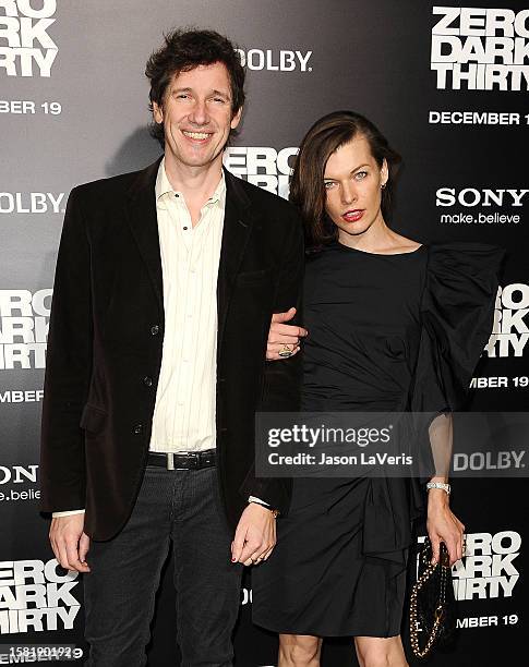 Director Paul WS Anderson and actress Milla Jovovich attend the premiere of "Zero Dark Thirty" at the Dolby Theatre on December 10, 2012 in...