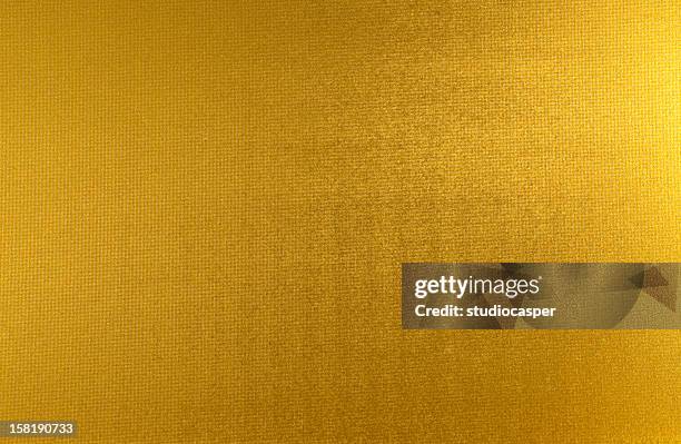 metallic gold sheet with ripples  - gold leaf stock pictures, royalty-free photos & images