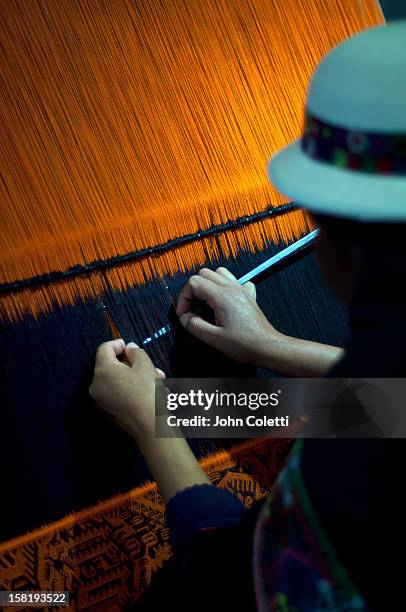 weaver creates a tapestry in sucre, bolivia - tapestry stock pictures, royalty-free photos & images