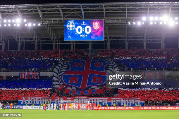 Fans display a choreography in the stands during the SuperLiga Round 4 match between FCSB and CFR Cluj at Stadionul Steaua on August 06, 2023 in...