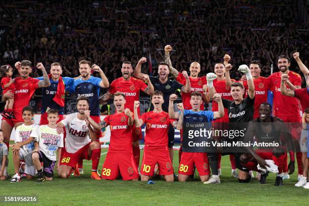 Players of FCSB celebrates after the winning during the SuperLiga Round 4 match between FCSB and CFR Cluj at Stadionul Steaua on August 06, 2023 in...