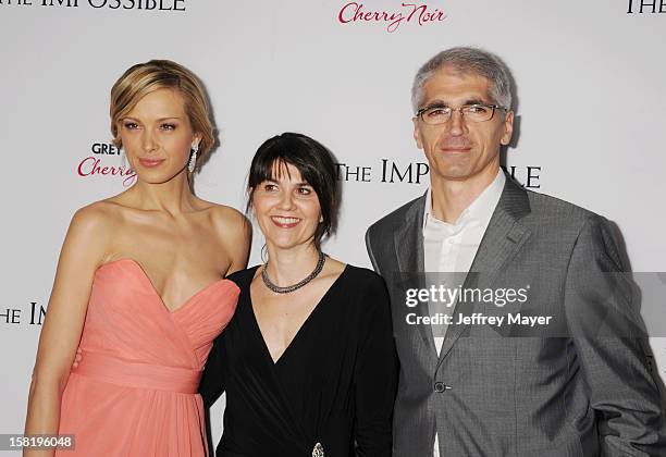 Model Petra Nemcova, producer Maria Belon and Enrique Alvarez arrive at the 'The Impossible' - Los Angeles Premiere at ArcLight Cinemas Cinerama Dome...