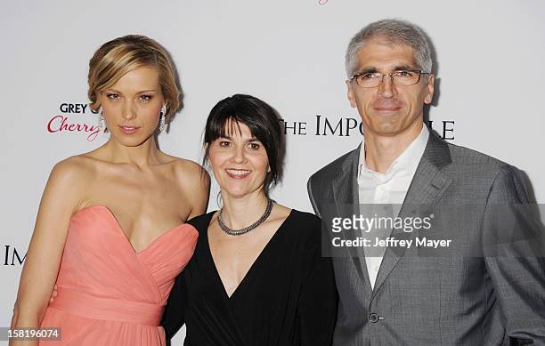 Model Petra Nemcova, producer Maria Belon and Enrique Alvarez arrive at the 'The Impossible' - Los Angeles Premiere at ArcLight Cinemas Cinerama Dome...