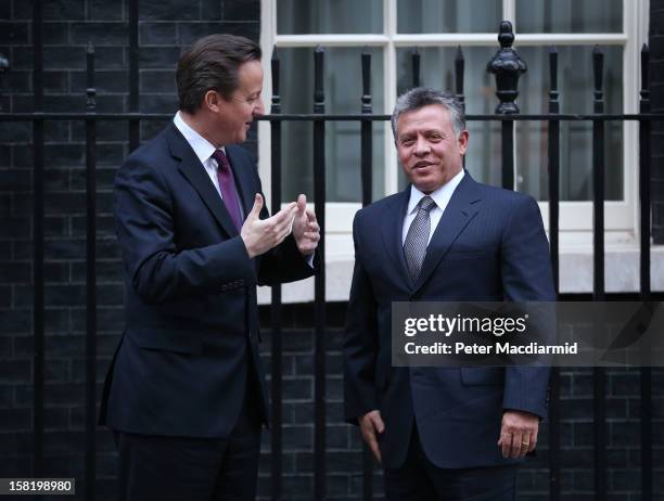 King Abdullah II of Jordan meets with Prime Minister David Cameron at 10 Downing Street on December 11, 2012 in London, England. King Abdullah, on a...