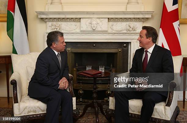 King Abdullah II of Jordan speaks with Prime Minister David Cameron inside 10 Downing Street on December 11, 2012 in London, England. King Abdullah,...