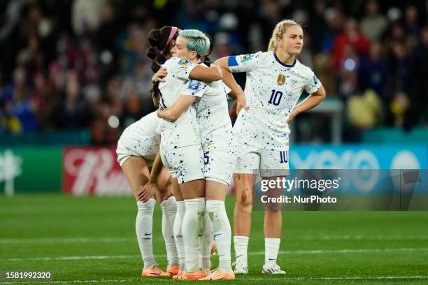 Sophia Smith of USA and Portland Thorns, Megan Rapinoe of USA and OL Reign and Lindsey Horan of USA and Olympique Lyonnais after losing the FIFA...