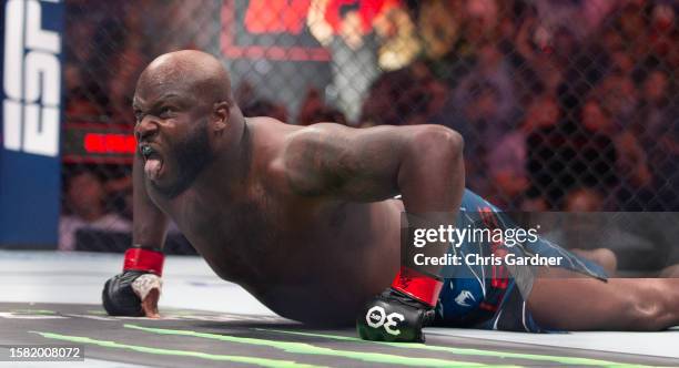 Derrick Lewis celebrates his win over Marcos Rogerio de Lima during their Heavyweight fight at UFC 291 at the Delta Center July 29, 2023 at the in...