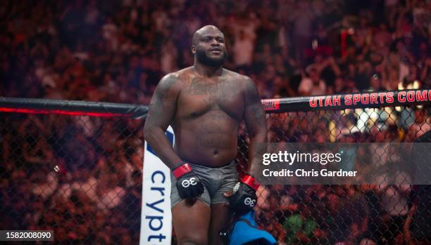 Derrick Lewis holds his shorts as he celebrates his win over Marcos Rogerio de Lima during their Heavyweight fight at UFC 291 at the Delta Center...