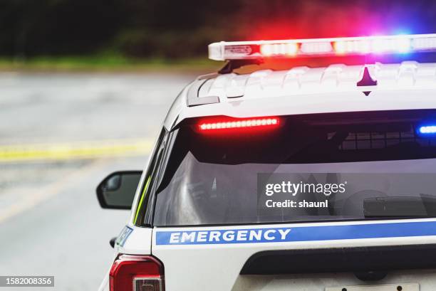 police blockade - police car stock pictures, royalty-free photos & images