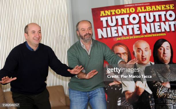 Actor Antonio Albanese and Director Giulio Manfredonia attend 'Tutto Tutto Niente Niente' photocall on December 11, 2012 in Milan, Italy.