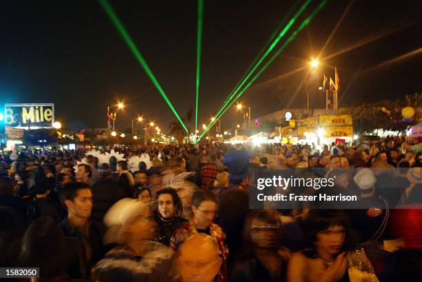 Party goers dress up for the 2002 West Hollywood Halloween Parade, featuring Pink October 31, 2002 on Santa Monica Boulevard in West Hollywood,...