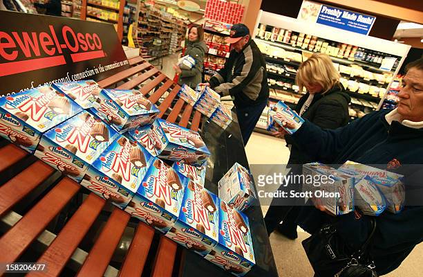 Customers grab up Hostess snacks at a Jewel-Osco grocery store on December 11, 2012 in Chicago, Illinois. The Jewel-Osco grocery store chain...