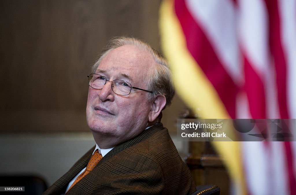 Sen. Jay Rockefeller, D-W. Va., listens during the news conference to ...