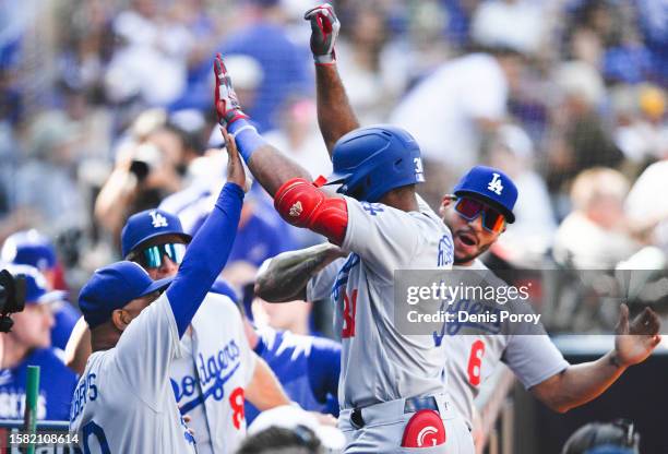 Amed Rosario of the Los Angeles Dodgers celebrates his two-run home run in the first inning against the against the San Diego Padres on August 6,...