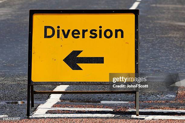 british diversion road sign on a street in scotland - road construction stock pictures, royalty-free photos & images