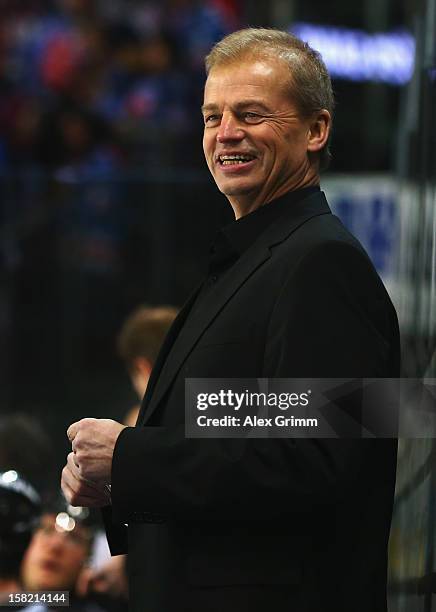 New head coach Bengt-Ake Gustafsson of Ice Tigers smiles during the DEL match between Thomas Sabo Ice Tigers and Straubing Tigers at Arena...