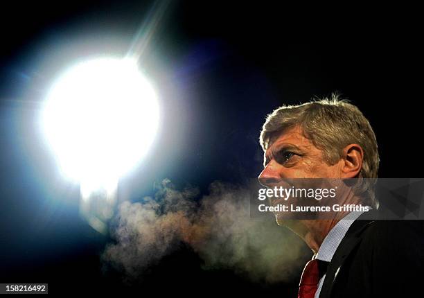 Arsene Wenger the Arsenal manager looks on during the Capital One Cup quarter final match between Bradford City and Arsenal at the Coral Windows...