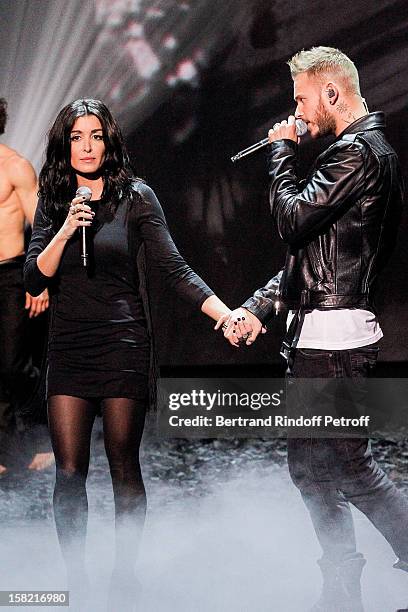 Singers Jenifer and M Pokora pay a tribute in music to Gregory Lemarchal during 'La Chanson De L'Annee 2012' Show Recording at Palais des Sports on...