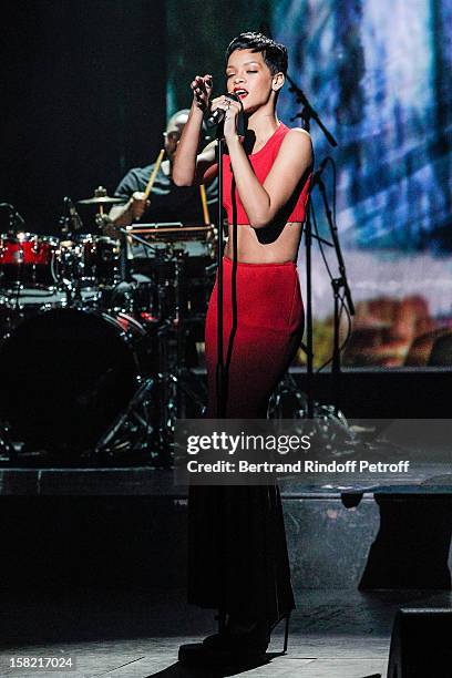 Singer Rihanna performs during 'La Chanson De L'Annee 2012' Show Recording at Palais des Sports on December 10, 2012 in Paris, France.