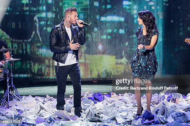 Singers Tal and M Pokora perform during 'La Chanson De L'Annee 2012' Show Recording at Palais des Sports on December 10, 2012 in Paris, France.