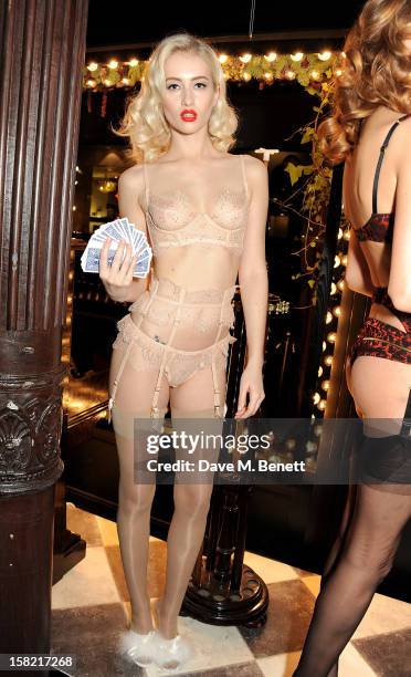 Model poses at the opening of the new Agent Provocateur boutique in Mayfair hosted by Josephine de la Baume on December 11, 2012 in London, England.