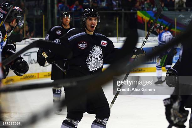 Daniel Weiss of Ice Tigers celebrates his team's fourth goal during the DEL match between Thomas Sabo Ice Tigers and Straubing Tigers at Arena...