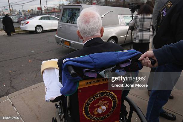 James McCormick leaves the St. Charles Catholic Church after a funeral for his longtime partner David Maxwell who died during Hurricane Sandy in the...