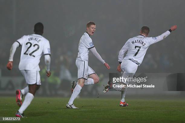 Sam Clucas of Hereford United celebrates scoring the equalising goal with Marley Watkins during the FA Cup with Budweiser Second Round Replay match...
