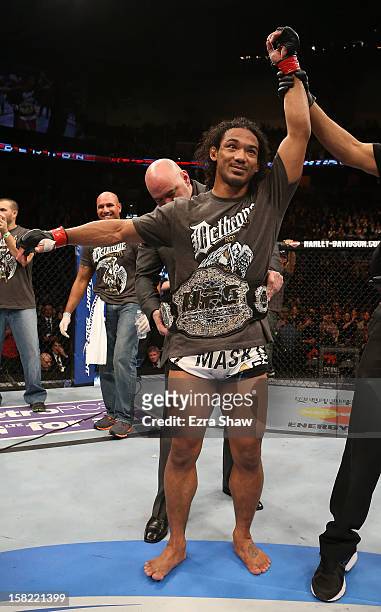 Benson Henderson reacts after defeating Nate Diaz during their lightweight championship bout at the UFC on FOX event on December 8, 2012 at Key Arena...
