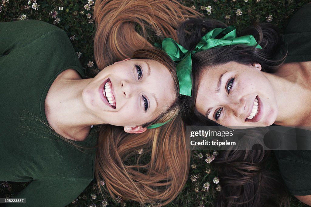 Sisters Laughing and Laying Down