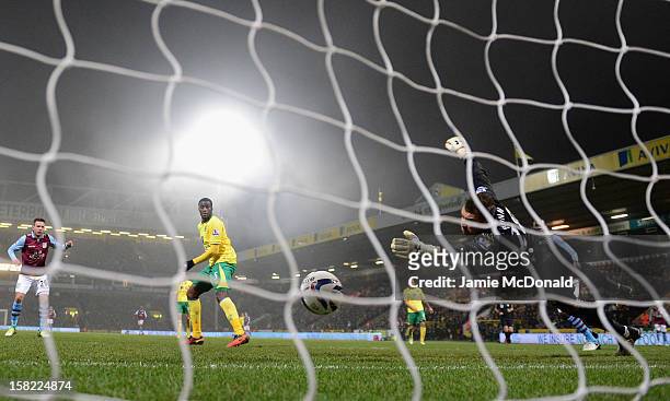 Andreas Wiemann of Aston Villa scores his goal during the Capital One Cup Quarter-Final match between Norwich City and Aston Villa at Carrow Road on...