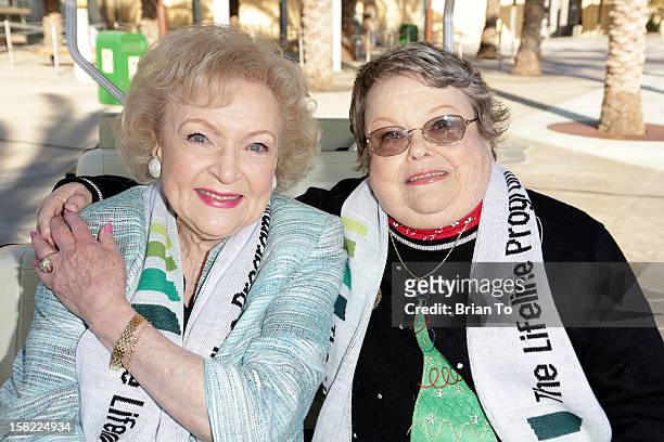 Actress Betty White and winner of The Lifeline Program's national "Bucket List" Facebook contest Leslie Scott attend Betty "White Out" Tour at The...