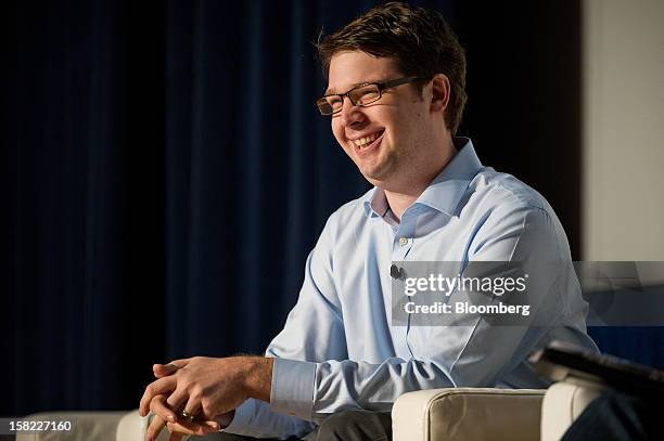 Andrew Mason, chief executive officer at Groupon Inc., smiles during a keynote address at the Mobile Loco Conference 2012 in San Francisco,...