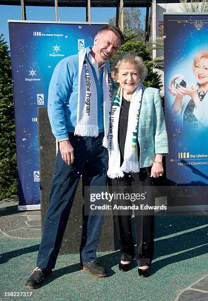The Lifeline Program spokesperson Betty White and The Lifeline Program President and CEO Scott Page attend the "White Hot" Holiday Event at The Los...