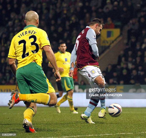 Aston Villa's Austrian striker Andreas Weimann scores a goal against Norwich City during their English League Cup quarter final football match at...