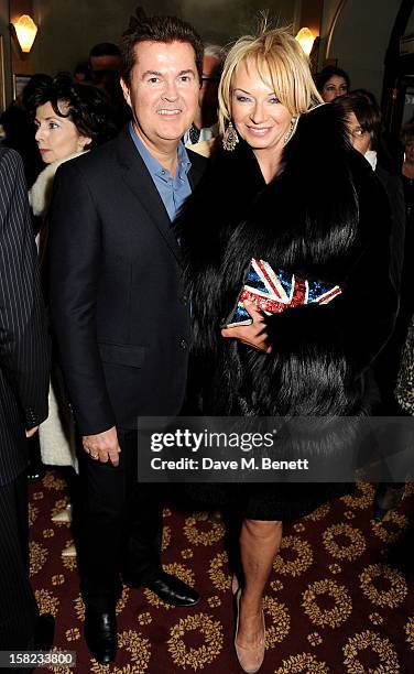 Simon Fuller and Judy Craymer arrive at the Gala Press Night performance of 'Viva Forever' at the Piccadilly Theatre on December 11, 2012 in London,...