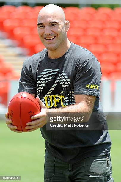 Brian Ebersole handballs during a UFC media session with the AFL Gold Coast Suns at Metricon Stadium on December 12, 2012 on the Gold Coast,...