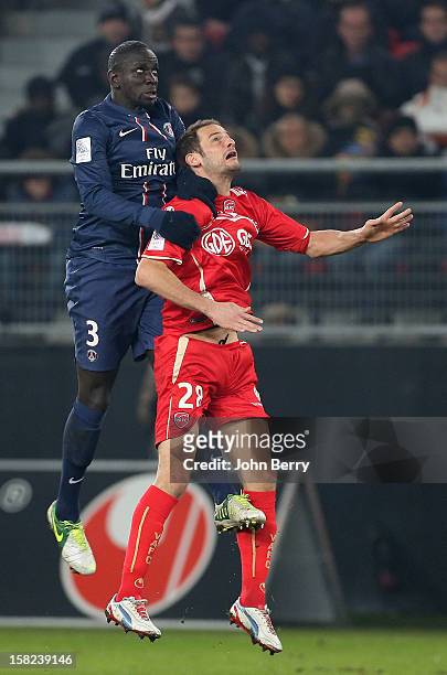 Mamadou Sakho of PSG and Gregory Pujol of VAFC in action during the French Ligue 1 match between Valenciennes FC and Paris Saint-Germain FC at the...