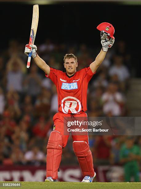 Aaron Finch of the Renegades celebrates as he reaches his century during the Big Bash League match between the Melbourne Renegades and the Melbourne...