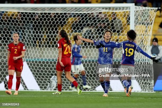 Mina Tanaka of Japan celebrates with teammate Miyabi Moriya after scoring her team's fourth goal during the FIFA Women's World Cup Australia & New...